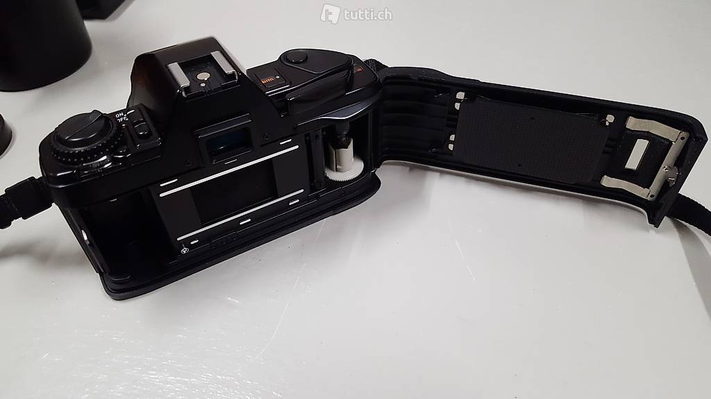 Minolta X-300s Fotoausrüstung / 3 Objektive / Blitz / Tasche